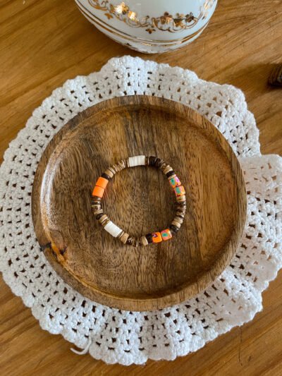 Bracelet surfeurs - perle heishi - perle de coco - bracelet perle de coco - bracelet hippie - bracelet surf - surf - surfeur - bijoux surfeur - bracelet orange - bracelet sunset